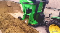 Vertical fodder mixing cart with automated silage extraction